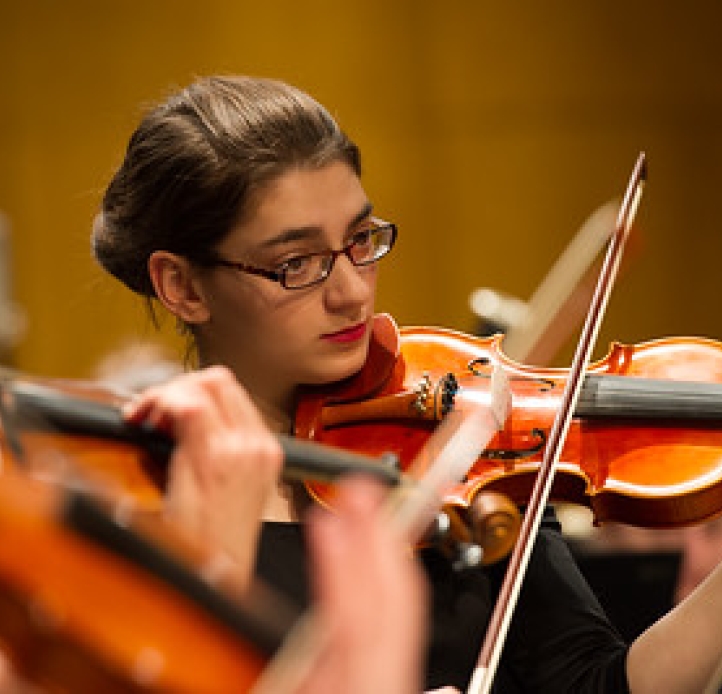 Student playing a violin