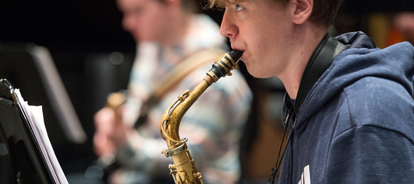 Saxophone player in rehearsal